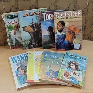 8 paperback books about dogs.